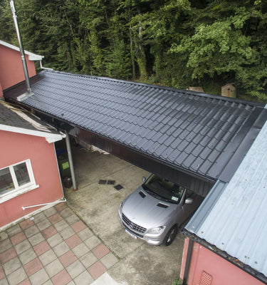 Tile effect roof sheeting on porch and garage, recent project Co. Clare, Ireland